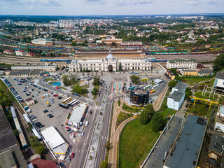 Obraz premium aerial view of city transport hub railway tram bus station