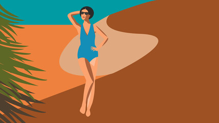 Woman in bathing suit poses for photo on dunes at seaside