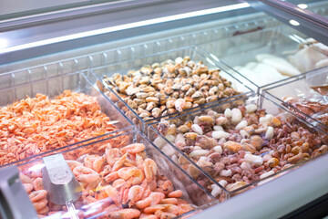Frozen seafood in the refrigerator. Supermarket food