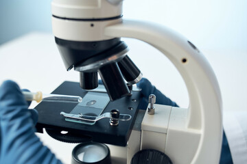 woman with microscope laboratory microbiology technology science