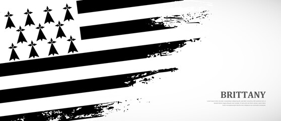 National flag of Brittany with textured brush flag. Artistic hand drawn brush flag banner background