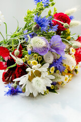 floral bouquet of different flowers on a white background