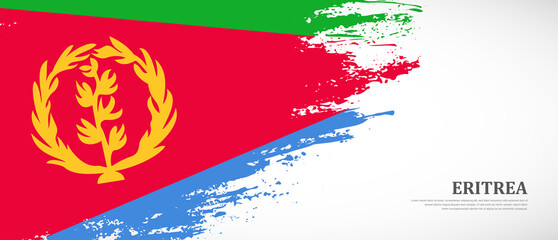 National flag of Eritrea with textured brush flag. Artistic hand drawn brush flag banner background