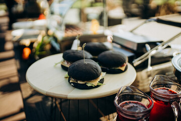 black hamburger on a plate