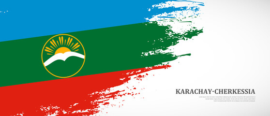National flag of Karachay-Cherkessia with textured brush flag. Artistic hand drawn brush flag banner background
