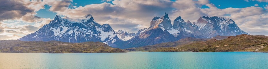 Obraz na płótnie Canvas Panoramic image of the mountain massif in Torres del Paine National Park in chilean part of Patagonia