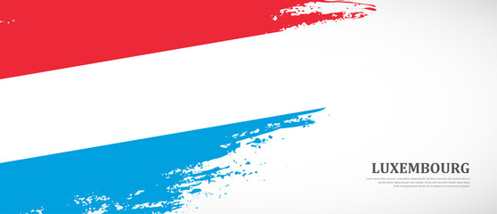 National flag of Luxembourg with textured brush flag. Artistic hand drawn brush flag banner background