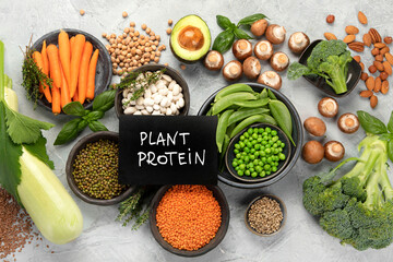 Natural sources of plant protein on light background.