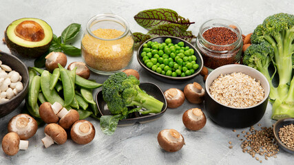 Natural sources of plant protein on light background.