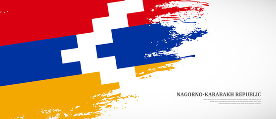 National flag of Nagorno-Karabakh Republic with textured brush flag. Artistic hand drawn brush flag banner background