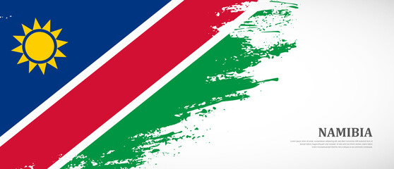 National flag of Namibia with textured brush flag. Artistic hand drawn brush flag banner background