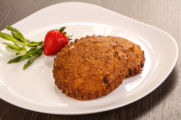 Oats cookies pastry served strawberry