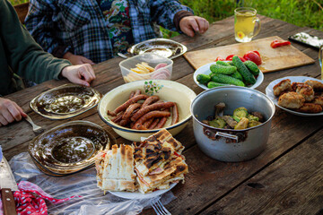 Outdoor recreation. Close-up food on a wooden table.