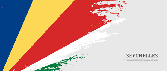 National flag of Seychelles with textured brush flag. Artistic hand drawn brush flag banner background