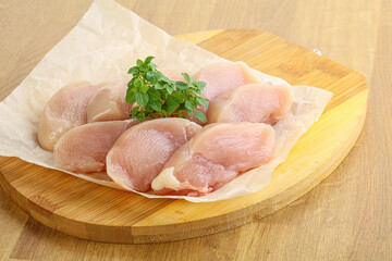 Raw chicken breast slices for cooking