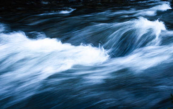 water flowing or rapids over rocks