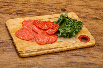 Italian spycy pepperoni sausage slices