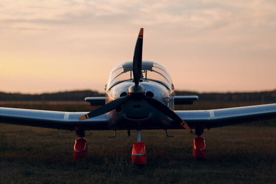 RUSSIA, MOSCOW - AUGUST 1, 2020: Small private single engine propeller airplane at sunset regional airport.