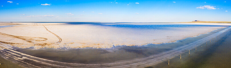 Beautiful view, wildlife and industrial landscape at Salt lake Baskunchak, Astrakhan region Russia.