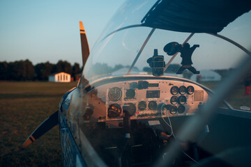 Cockpit view from small private single motor airplane.