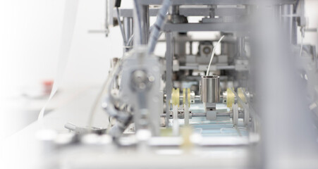 Industry and factory concept, medical face mask production line.