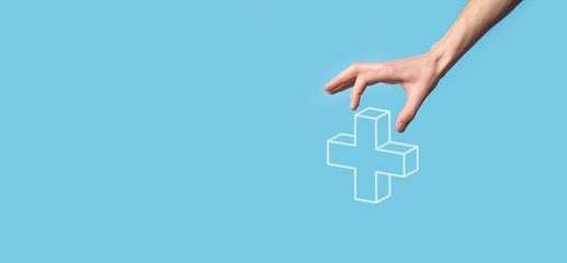 Hand hold 3D plus icon, man hold in hand offer positive thing such as profit, benefits, development, CSR represented by plus sign.The hand shows the plus sign