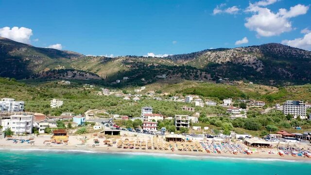 Birdseye view of Himara Beach and Adriatic Sea. Beautiful water Albania Riviera
