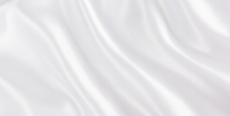 abstract smooth elegant white fabric silk texture soft background,flowing satin waves