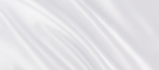 Fototapeta na wymiar abstract smooth elegant white fabric silk texture soft background,flowing satin waves