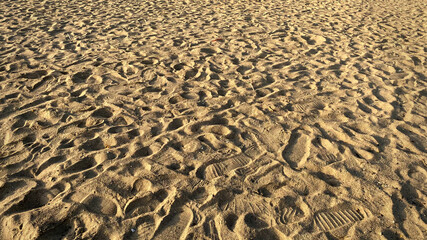 Footprints in the sand beach.