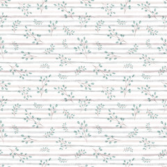 Seamless vintage pattern with leaves on a striped background