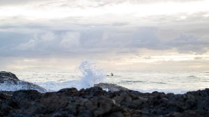 Sunrise Kayaker out to sea 