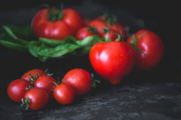 Fresh tomatoes, cherry tomato. Fresh vegetables on table. Market vegetable, garden.Diet concept. Healthy organic vegetarian food.