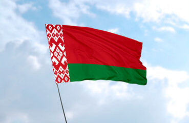 Flag of Belarus, realistic 3d rendering in front of blue sky