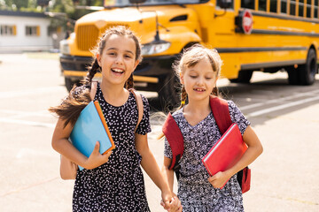 Basic school students crossing the road
