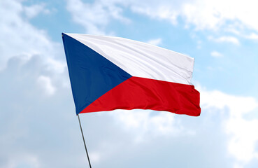 Flag of Czech Republic, realistic 3d rendering in front of blue sky