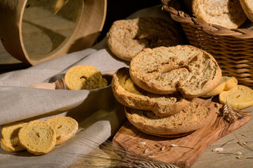 Italian appetizer Friselle. Apulian dried bread Friselle in wooden background