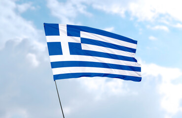 Obraz premium Flag of Greece, realistic 3d rendering in front of blue sky