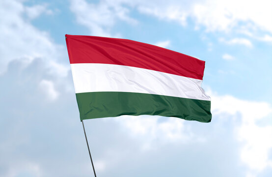 Flag of Hungary, realistic 3d rendering in front of blue sky