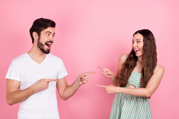Photo of cool millennial brown hair couple point wear white t-shirt dress isolated on pink color backgound