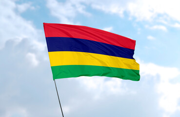 Flag of Mauritius, realistic 3d rendering in front of blue sky