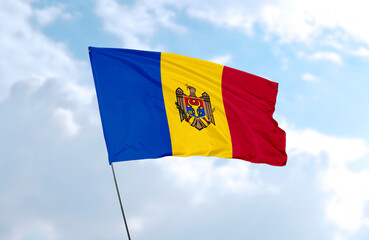 Flag of Moldova, realistic 3d rendering in front of blue sky