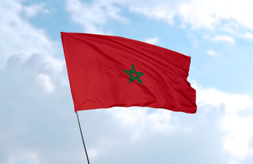 Flag of Morocco, realistic 3d rendering in front of blue sky