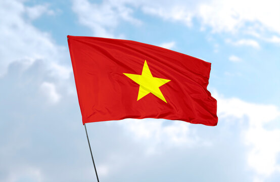 Flag of Vietnam, realistic 3d rendering in front of blue sky