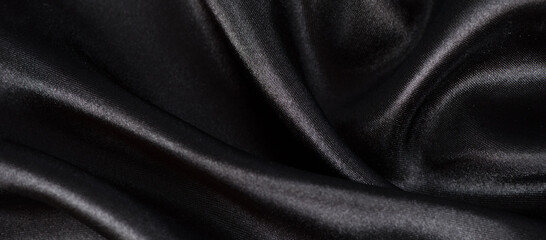 Fototapeta premium Black luxury fabric background with copy space