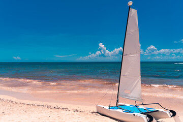 a yacht on sand
