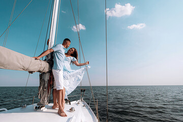 happy family mom dad son sailing on a yacht on a joint weekend. sea vacation.