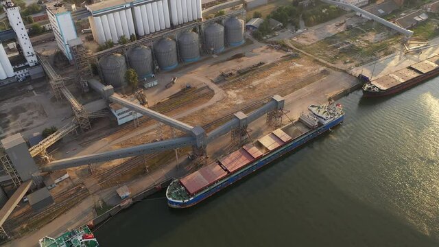 Loading ships with wheat grain for export in the port.  Aerial view
