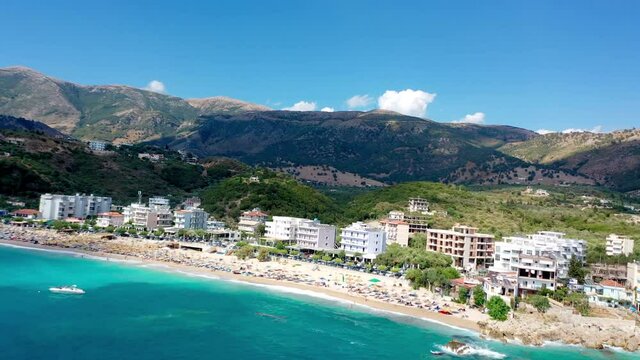 Birdseye view of Himara Beach and Adriatic Sea. Beautiful water Albania Riviera