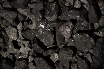 Top view of a coal mine mineral black for background. Used as fuel for industrial coke.